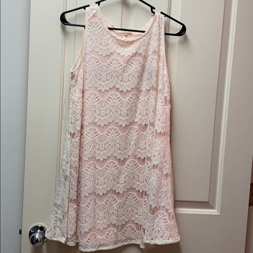 White lace dress with pink under